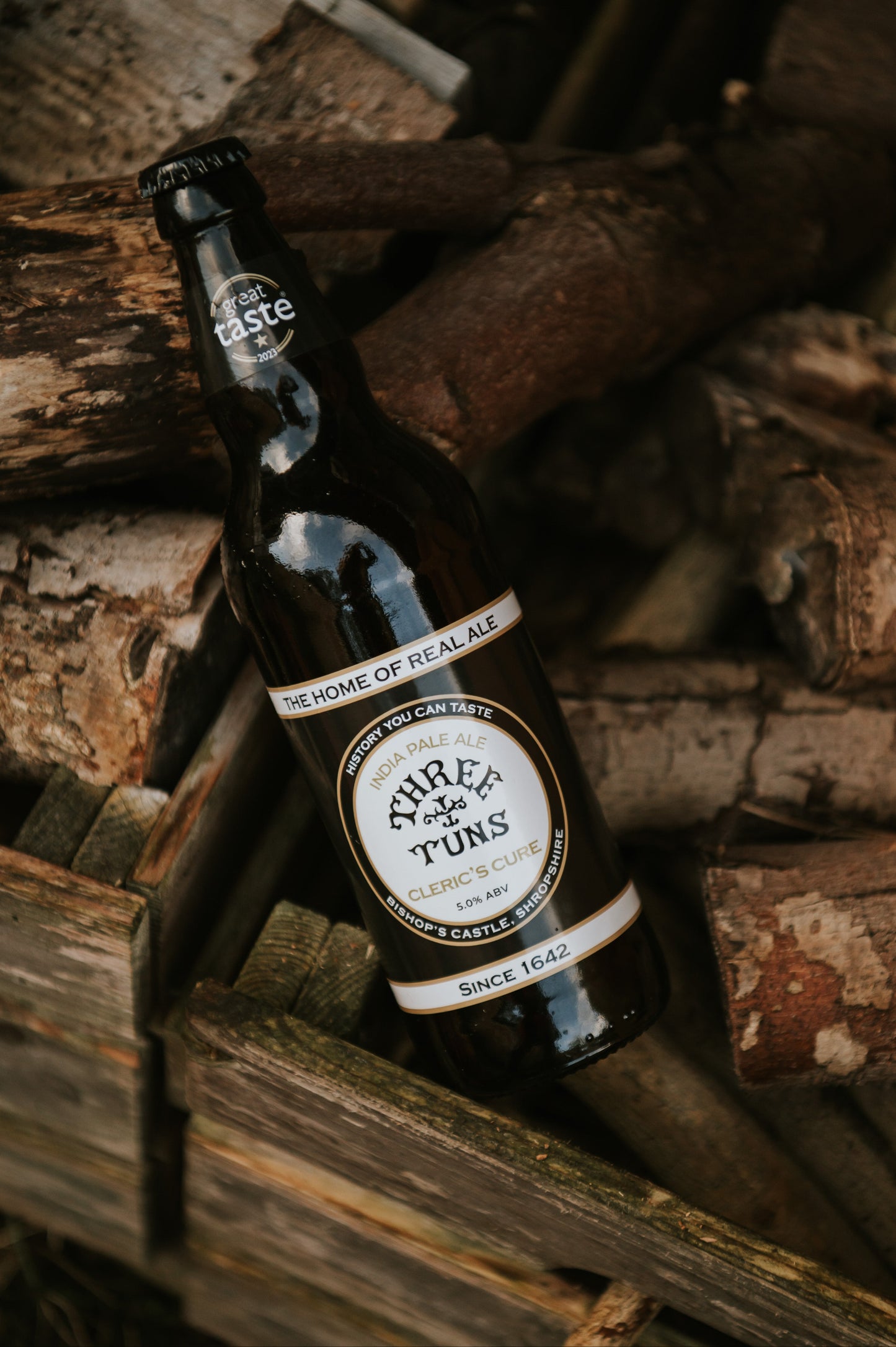 bottle of three tuns brewery cleric's cure india pale ale 